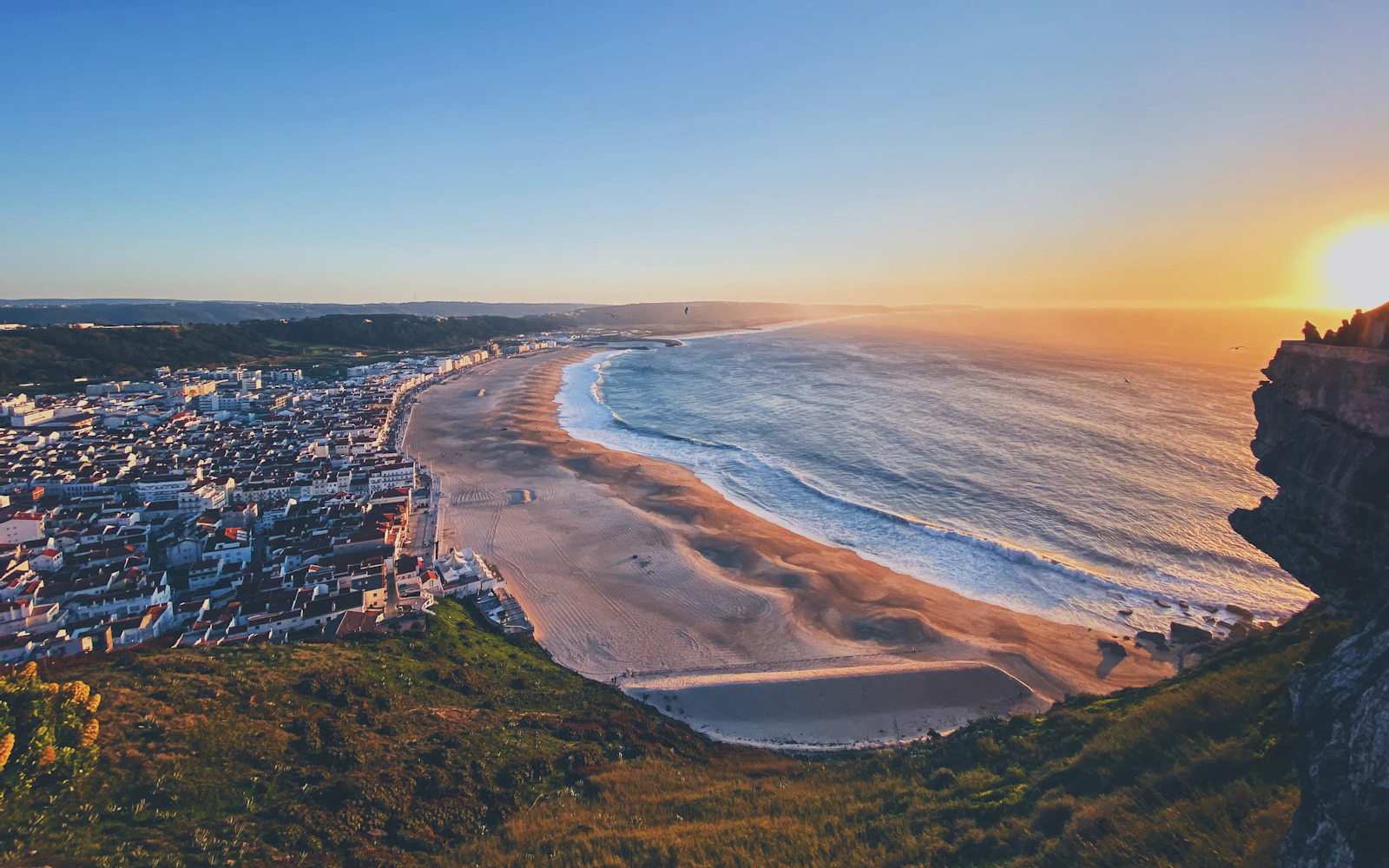 Nazaré: meet the Atlantic from beach level and above.